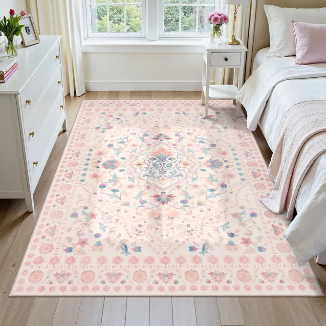 Covaba vintage persian floral area rug in blush clay, styled in a room setting