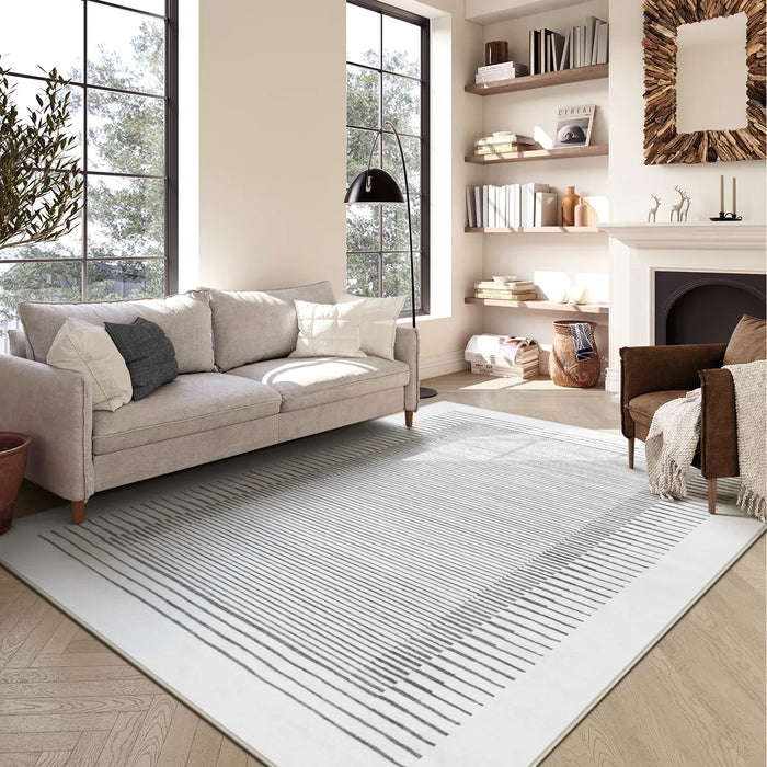 Covaba modern minimalist line area rug in pearl grey, styled in a room setting