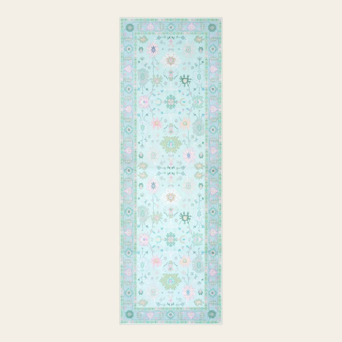 Covaba boho oushak floral runner rug in teal haze, shown flat on a plain ivory backdrop