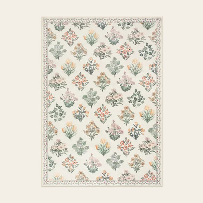 Covaba meadow floral area rug in warm beige, shown flat on a plain ivory backdrop
