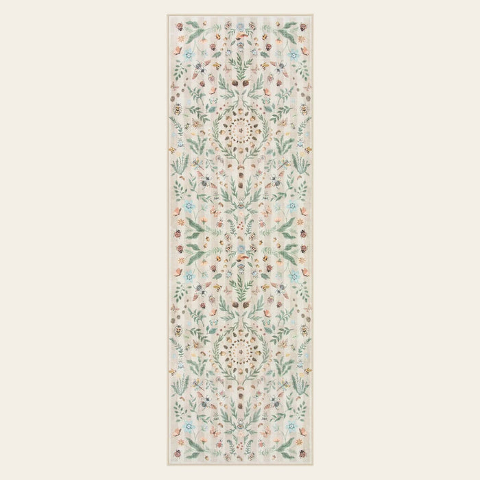 Covaba boho insect botanical floral runner rug in warm beige, shown flat on a plain ivory backdrop