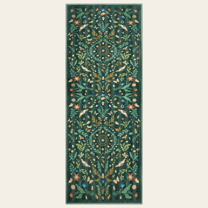 Covaba boho insect botanical floral runner rug in forest fern, shown flat on a plain ivory backdrop