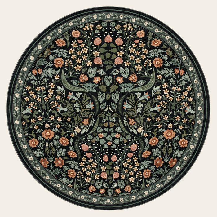 Covaba maximalism vibrant blossom floral round rug in ink black, shown flat on a plain ivory backdrop