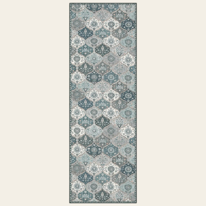 Covaba ultra-thin vintage floral moroccan trellis runner rug in stormy blue, shown flat on a plain ivory backdrop