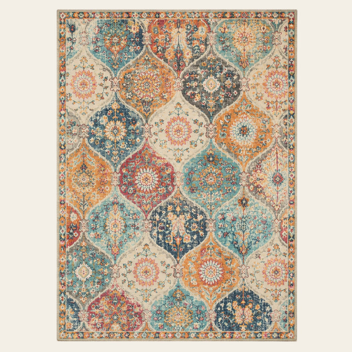 Covaba ultra-thin vintage floral moroccan trellis and area rug in faded rose, shown flat on a plain ivory backdrop