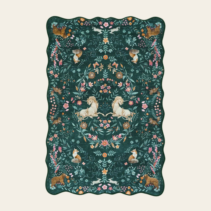 Covaba maximalist unicorn garden scalloped doormat in forest fern, shown flat on a plain ivory backdrop
