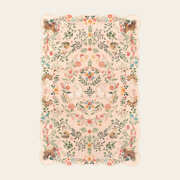 Covaba maximalist unicorn garden scalloped doormat in blush clay, shown flat on a plain ivory backdrop