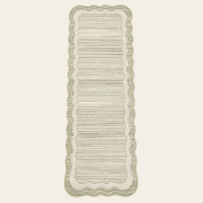 Covaba modern abstract bordered scalloped runner rug in warm beige, shown flat on a plain ivory backdrop