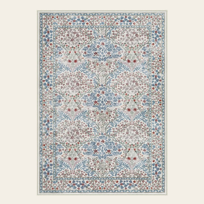 Covaba maximalism vintage french floral doormat in warm beige, shown flat on a plain ivory backdrop