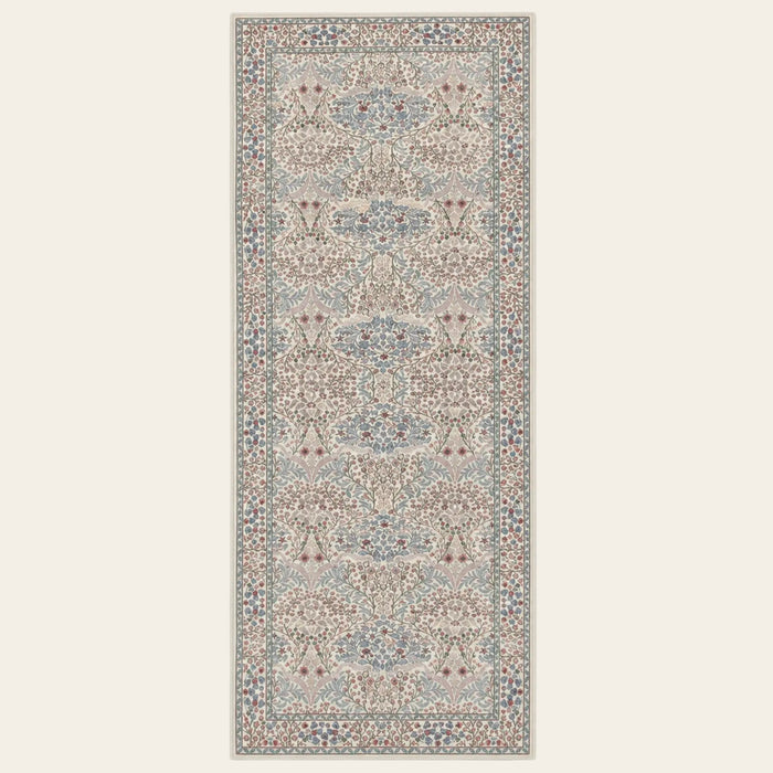 Covaba maximalism vintage french floral runner rug in warm beige, shown flat on a plain ivory backdrop
