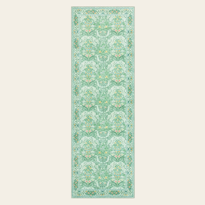 Covaba maximalism vintage french floral runner rug in willow sage, shown flat on a plain ivory backdrop
