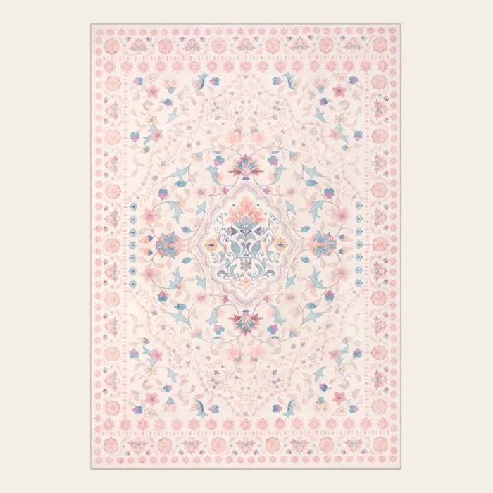 Covaba vintage persian floral area rug in blush clay, shown flat on a plain ivory backdrop