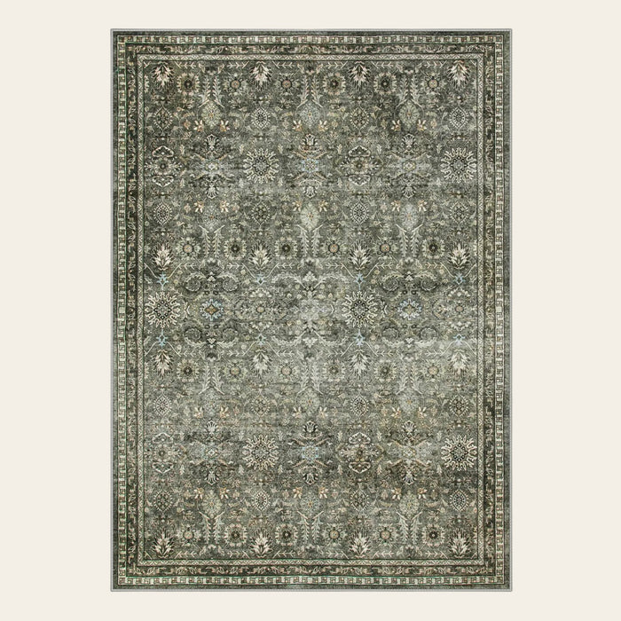 Covaba vintage persian area rug in forest fern, shown flat on a plain ivory backdrop