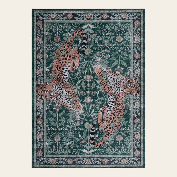 Covaba vintage leopard area rug in fern green, shown flat on a plain ivory backdrop
