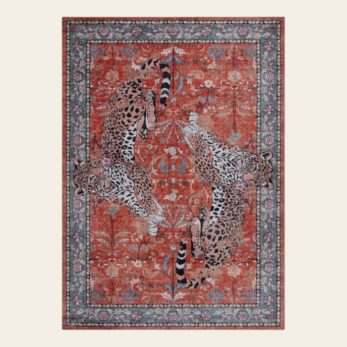 Covaba vintage leopard area rug in burnt rust, shown flat on a plain ivory backdrop