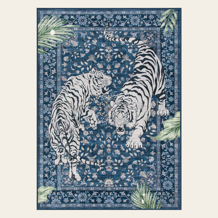 Covaba wild tiger area rug in stormy blue, shown flat on a plain ivory backdrop