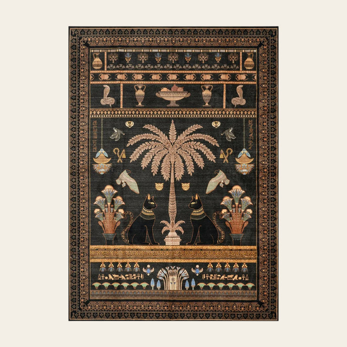 Covaba ancient egyptian revival cat area rug in ink black, shown flat on a plain ivory backdrop