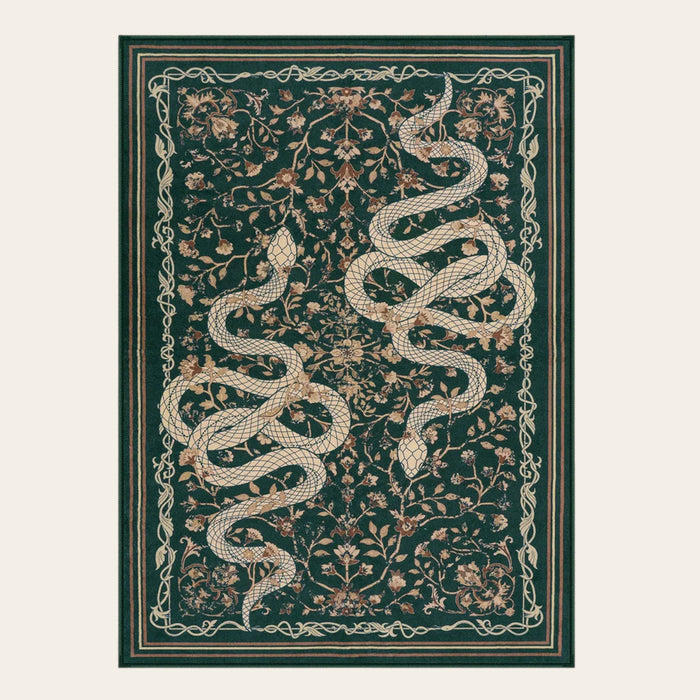 Covaba mystical snake area rug in fern green, shown flat on a plain ivory backdrop