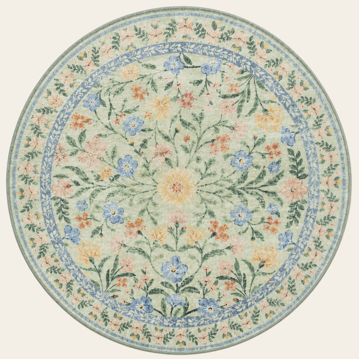 Covaba boho modern parisian garden floral round rug in fern green, shown flat on a plain ivory backdrop