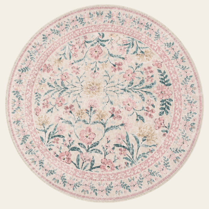 Covaba boho modern parisian garden floral round rug in blush clay, shown flat on a plain ivory backdrop