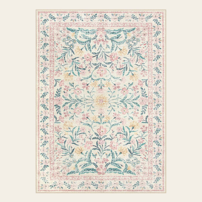 Covaba boho modern parisian garden floral area rug in blush clay, shown flat on a plain ivory backdrop