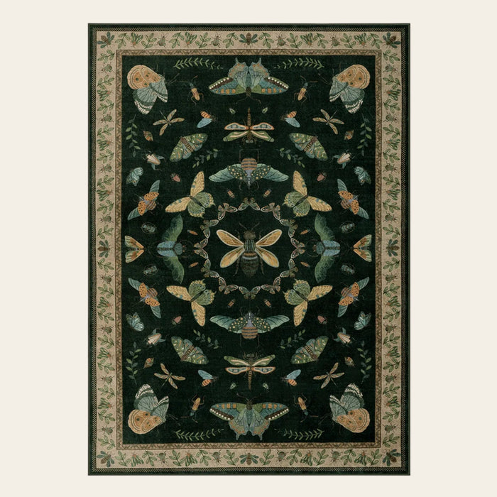Covaba cottagecore botanical insect area rug in forest fern, shown flat on a plain ivory backdrop