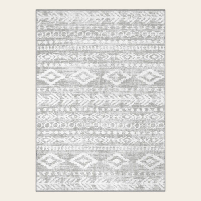 Covaba modern rustic farmhouse moroccan tribal grey/white area rug in soft white, shown flat on a plain ivory backdrop