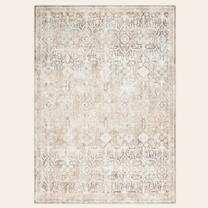 Covaba vintage sand area rug in warm beige, shown flat on a plain ivory backdrop