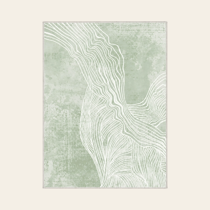 Fern green abstract terrain rug shown flat on a plain ivory backdrop, ivory contour lines drawn across a soft sage field