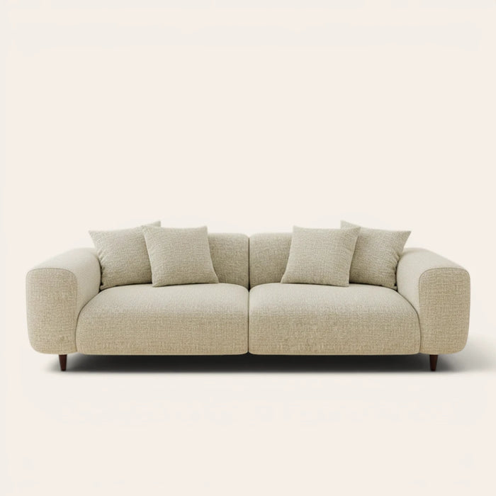 Willow haze chenille stretch cover fitted on a plush three-seat sofa, front view on ivory backdrop