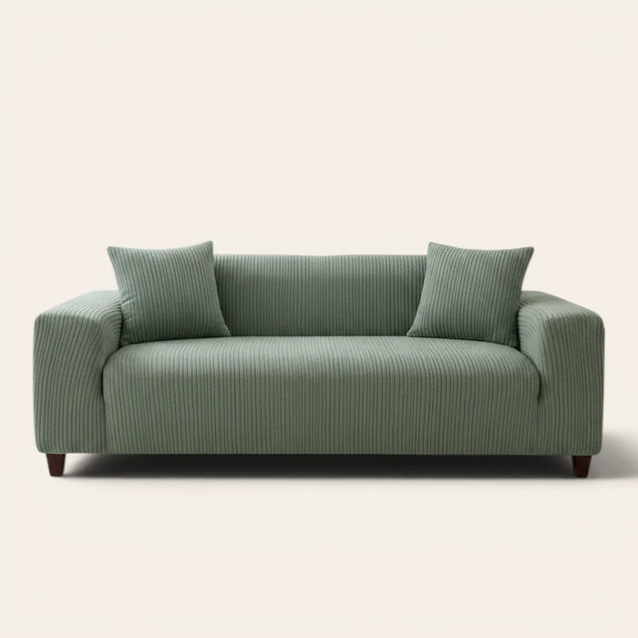 Olive mist corduroy sofa cover fitted on a three seater sofa, front view on ivory