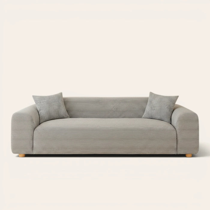 Midnight Tide ice silk sofa cover fitted on a three-seat sofa with matching cushions, front view on ivory