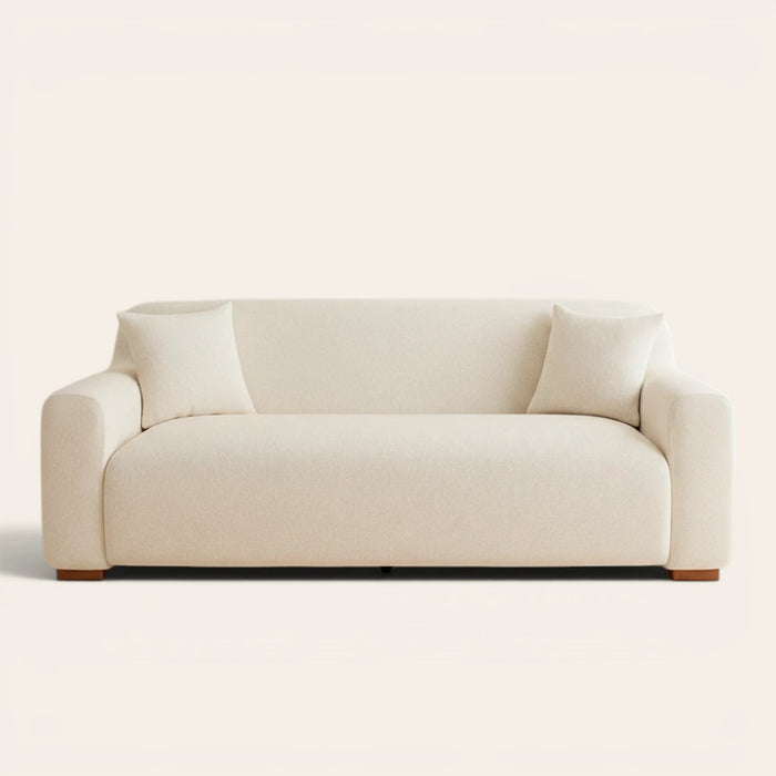Cream linen knit sofa cover fitted on a three-seater, front view on ivory backdrop