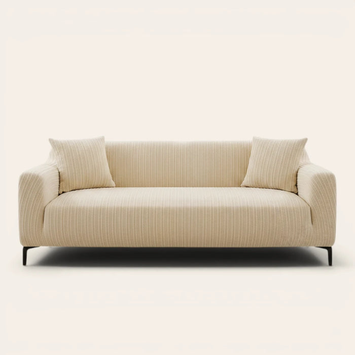 Honey taupe knit sofa cover fitted on a three-seater with vertical ribbing, front view on ivory backdrop