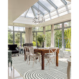 Covaba abstract rainbow stripe black/beige area rug in warm beige, shown flat on a plain ivory backdrop, view 9