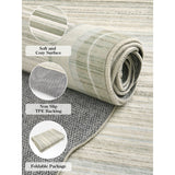 Covaba modern abstract bordered scalloped rug in warm beige, shown flat on a plain ivory backdrop
