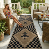 Covaba tribal soft easy jute indoor/outdoor runner rug in ink black, styled in a room setting, view 11
