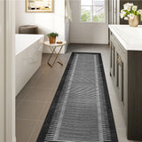 Covaba modern minimalist line runner rug in ink black, styled in a room setting, view 2