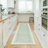 Covaba modern minimalist line runner rug in fern green, styled in a room setting