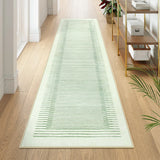 Covaba modern minimalist line runner rug in fern green, styled in a room setting, view 2