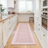 Covaba modern minimalist line runner rug in blush clay, styled in a room setting