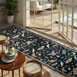 Covaba modern parisian insect runner rug in ink black, styled in a room setting, view 5