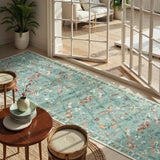 Covaba modern parisian insect runner rug in sage mist, styled in a room setting, view 2