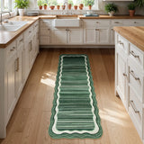 Covaba modern abstract bordered scalloped runner rug in fern green, styled in a room setting, view 4