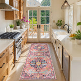 Covaba bohemian floral medallion runner rug in faded rose, styled in a room setting
