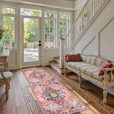 Covaba bohemian floral medallion runner rug in faded rose, styled in a room setting, view 2