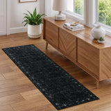 Covaba vintage persian distressed runner rug in ink black, styled in a room setting, view 10