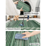 Covaba modern abstract bordered scalloped rug in fern green, shown flat on a plain ivory backdrop, view 2