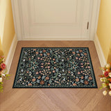 Covaba maximalism vibrant blossom floral doormat in ink black, styled in a room setting