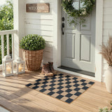 Covaba checkered easy jute natural indoor/outdoor doormat in ink black, styled in a room setting